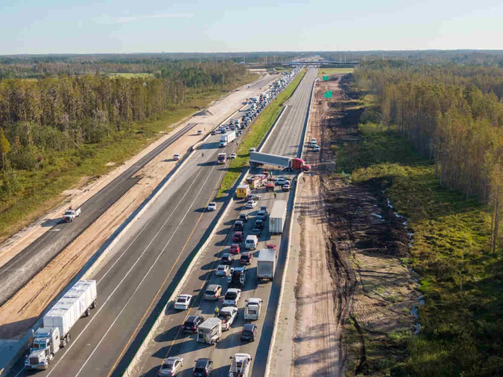 Truck crash blocks Texas highway after shifting cargo causes major accident and traffic jam on busy interstate