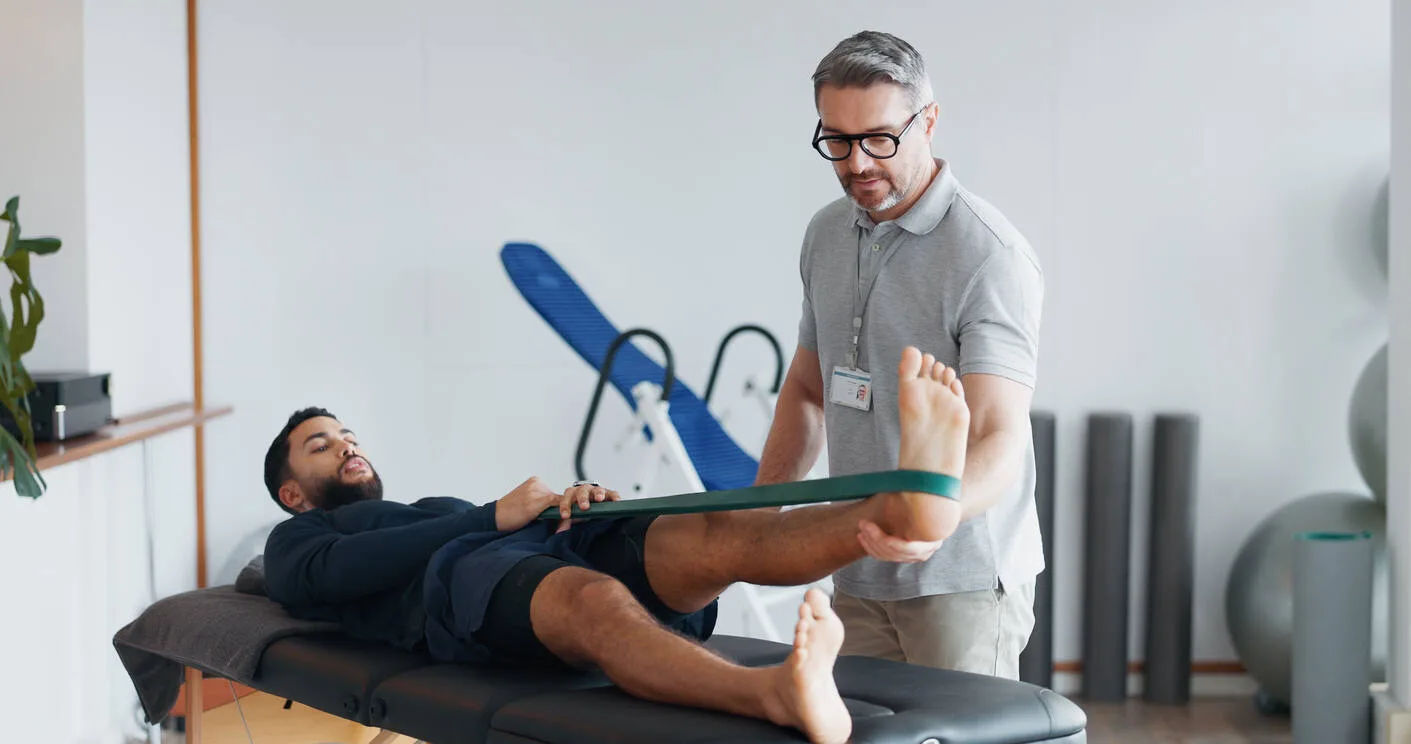 Physical therapy session with a patient after a Texas personal injury accident, highlighting the importance of consulting doctors for recovery and treatment.